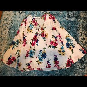 Floral bell-sleeve top, lace up v-neck.